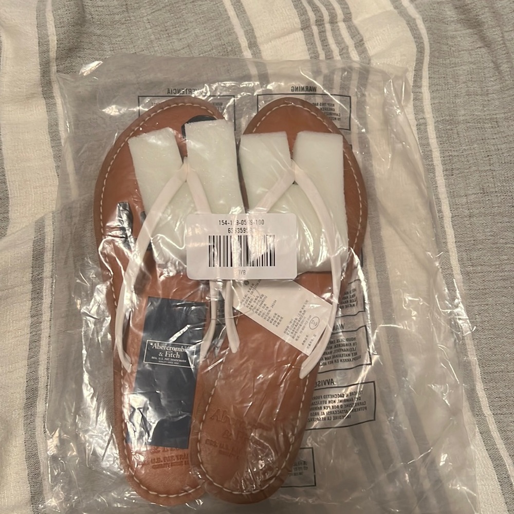 Abercrombie and Fitch Thin Strapped White Flip Flop
